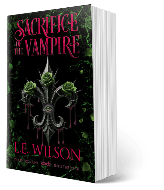 Book titled 'Sacrifice of the Vampire' by L.E. Wilson with a dark green background and vampire-romance